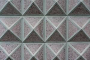 Triangular drawing of the building facade. Pyramid facade. Background triangles photo