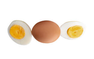 Raw chicken egg and peeled cooked or boiled egg with egg yolk in two halves in stack isolated with clipping path in file format png