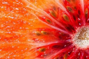 A close up of a grapefruit with seeds photo