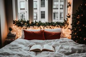 A bed with white sheets and a book on it photo