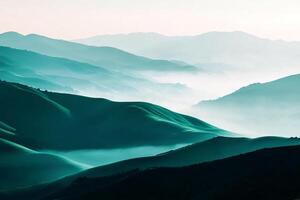 A view of the mountains with fog in the distance photo