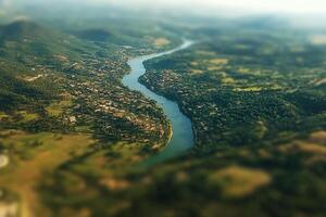 A river running through a green valley photo