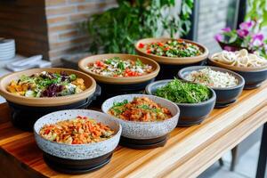 Catering buffet food service with delicious dishes displayed on wooden table photo
