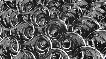 Intricate patterns of swirling metal create mesmerizing designs in industrial art video