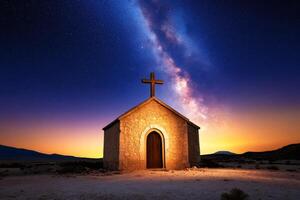 Small church standing alone in desert at sunset under milky way photo