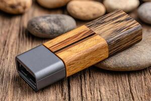 Elegant wooden usb flash drive resting on rustic wood surface photo