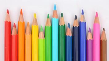 Full Saturation Pencil Stack on Left Edge, Light Gray Background photo