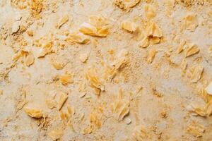 Natural yellow flour spread across a surface photo
