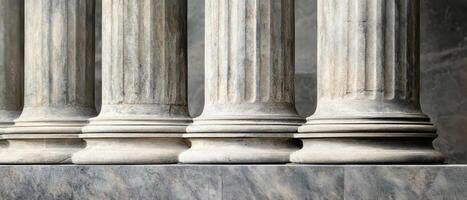 A row of columns in front of a building photo