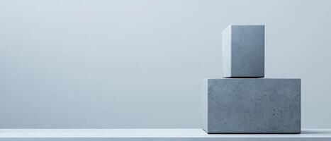 Concrete blocks arranged on a minimalistic display photo