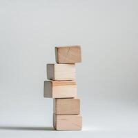 Stack of wooden blocks arranged neatly indoors photo