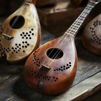 Wooden string instruments on rustic table photo