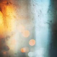 Reflections through a wet window with city lights photo
