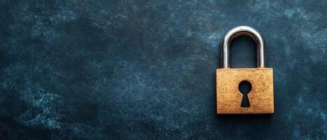 Vintage brass padlock on dark textured background photo