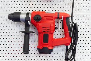 Hammer on the showcase of the hardware store photo