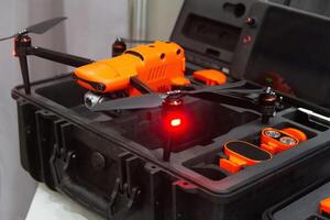 A drone with a camera in a box on a store photo