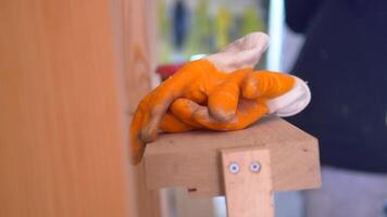 Painter prepares for work with gloves on station video