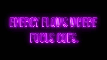 Multicolor Neon Energy flows where focus goes text animation video