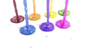 A group of colorful plastic cups with a white background video