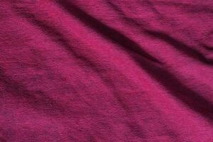Rich Magenta Fabric Texture with Soft Folds photo