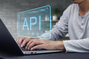 Modern Programming Interface Concept with API Display on Laptop photo