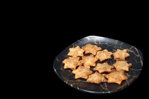 Dazzling Starry Aloo Puff Pastries on Glossy Black Marble - The Ultimate Party Treat photo