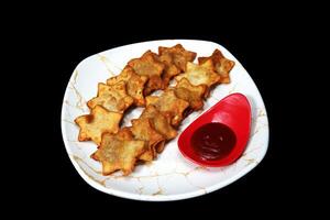 Flaky Aloo Puff Pastries and Tangy Tomato Sauce - A Harmonious Blend of Flavors for Any Celebration photo