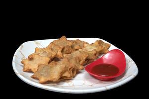 Crispy Aloo Puff Pastry with Rich Tomato Sauce - Flaky Layers and Savory Potato Filling Perfect for Tea-Time and Party Appetizers photo