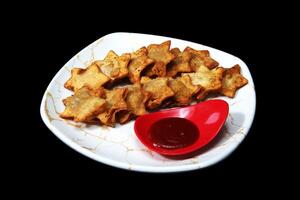 Flaky Aloo Puffs Paired with Bold Tomato Sauce - A Savory Delight for Any Occasion photo