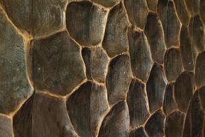 An Abstract Textured Wall That Showcases Unique and Distinctive Geometric Patterns and Designs photo