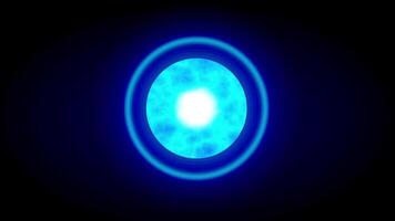 A radiant blue energy core pulses with glowing light and radiates circular waves outward in an ethereal and powerful display video