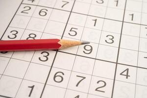 Sudoku puzzle game with pencil photo
