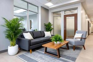 Modern office lobby featuring comfortable seating and decorative plants photo