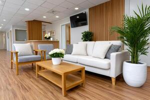 Modern waiting room with comfortable sofa, armchairs and wooden furniture welcoming patients photo