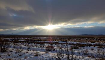 sunlight breaking through clouds over snowy tundra. photo