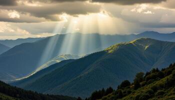 light breaking through stormy clouds over mountains. photo