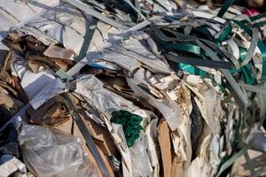Compressed garbage piles show major waste issues in landfills, emphasizing the need for better recycling efforts photo