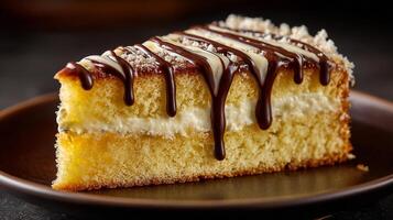 High resolution image of a moist cake with creamy topping photo