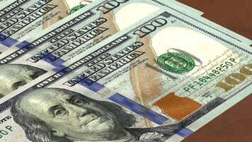 a close up of a stack of one hundred dollar bills video