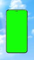 Animation of a smartphone flying in a blue sky with a vertical background of clouds and a green screen for product promotion and event notification need video