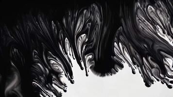 Dark ink curls into sharp sweeping strokes with claw-like textures video
