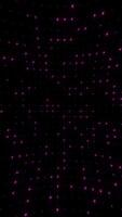 LED lights background with a grid of twinkling pink lights. Blinking stage lights animation. This vertical performance background is full HD and looping. video