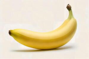 A banana is shown on a white background photo