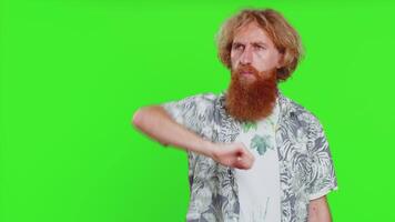 Get out of here. You are fired. Irritated caucasian man pointing finger away asking to leave her alone, strict boss firing, conflict, quarrel. Redhead guy isolated on chroma key background indoors video