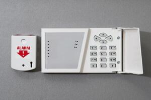 Panel security system on a gray background. Close-up. photo