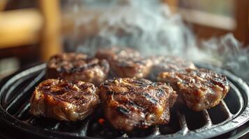 Sizzling steaks on a hot grill emitting fragrant cooking smoke photo