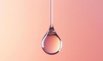 A droplet of liquid hangs from a stem photo