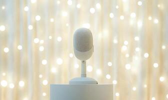 A microphone is on a stand in front of a curtain photo