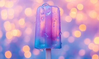 A blue and purple ice cream stick with a blue and purple ice cream on top photo