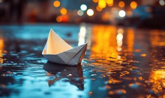 a paper boat floating in the rain photo